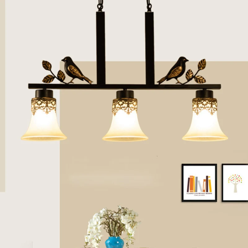 3-kops bruin glazen eilandlichthanger, traditionele zwarte afwerking, bel-eetkamerplafondlamp met vogeldeco Clearhalo