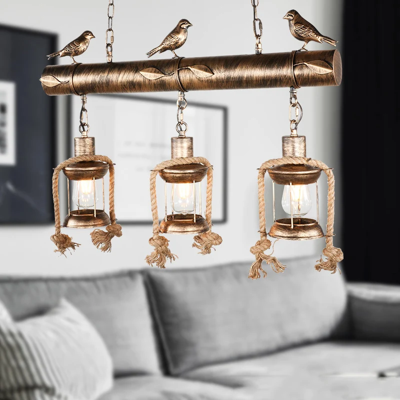 Coastal Lantern Island hanglampset met 3 lampen van helder glas antiek koper met vogel Clearhalo