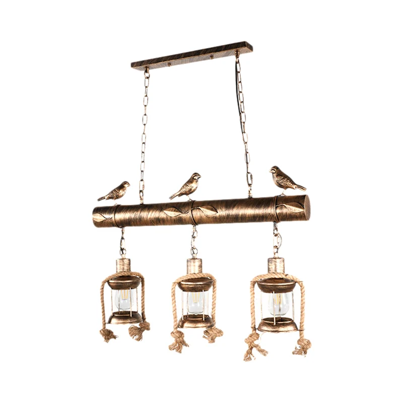 Coastal Lantern Island hanglampset met 3 lampen van helder glas antiek koper met vogel Clearhalo