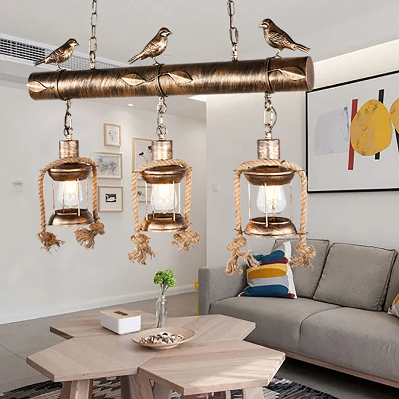 Coastal Lantern Island hanglampset met 3 lampen van helder glas antiek koper met vogel Clearhalo