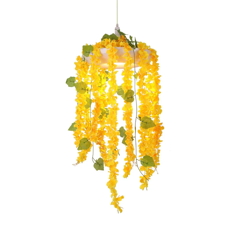 Gele hanglamp met 1 kop en hangende industriële metalen donut met bloemendeco van PVC Clearhalo