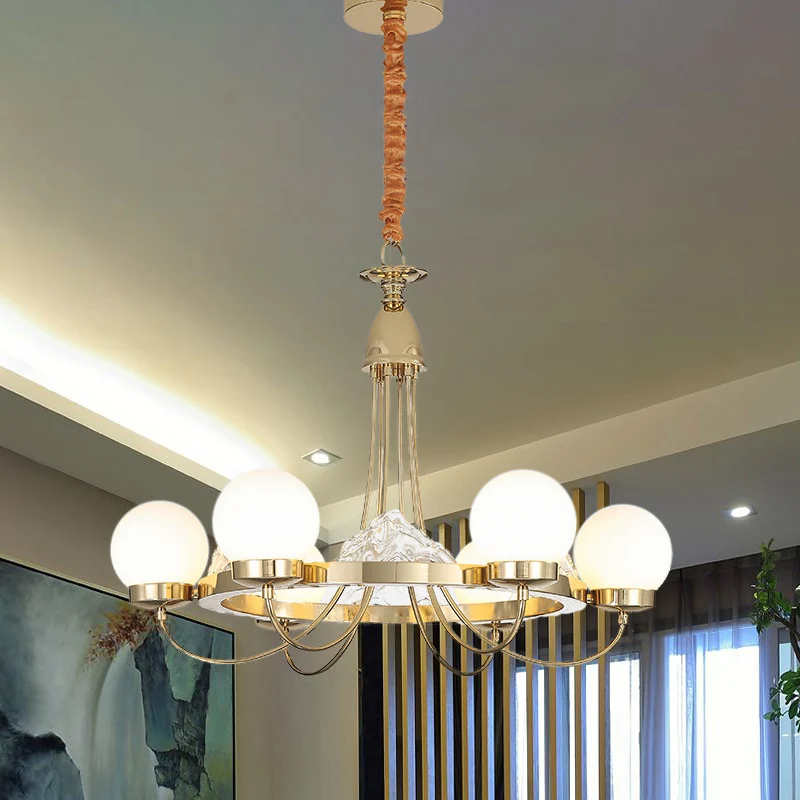 Gouden gebogen arm plafondkroonluchter Post Modern 6-kops metalen LED-hanglamp met globe-matte witte glazen kap Clearhalo