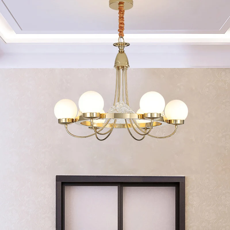Gouden gebogen arm plafondkroonluchter Post Modern 6-kops metalen LED-hanglamp met globe-matte witte glazen kap Clearhalo