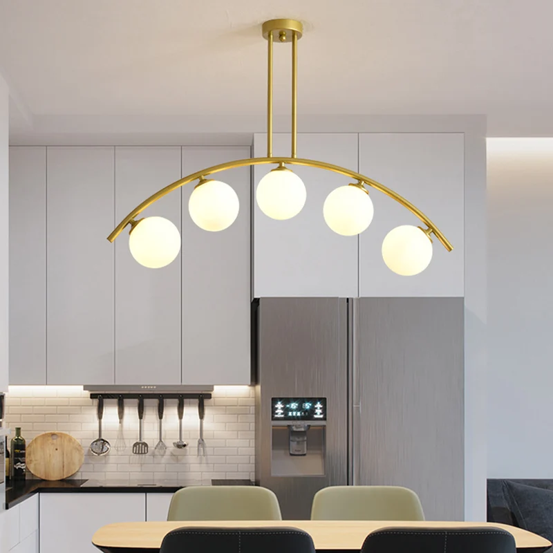 Mid-Century moderne gouden metalen eiland hanglamp bolvormige glazen eilandplafondlamp voor eettafel Clearhalo