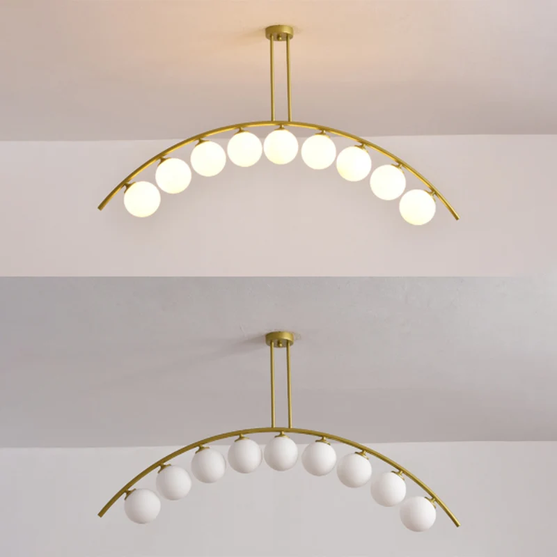 Mid-Century moderne gouden metalen eiland hanglamp bolvormige glazen eilandplafondlamp voor eettafel Clearhalo