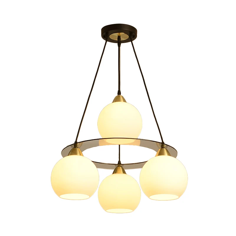 Moderne 4-kops kroonluchter licht zwart en goud bolvormige plafond hanglamp met opaal glazen kap Clearhalo