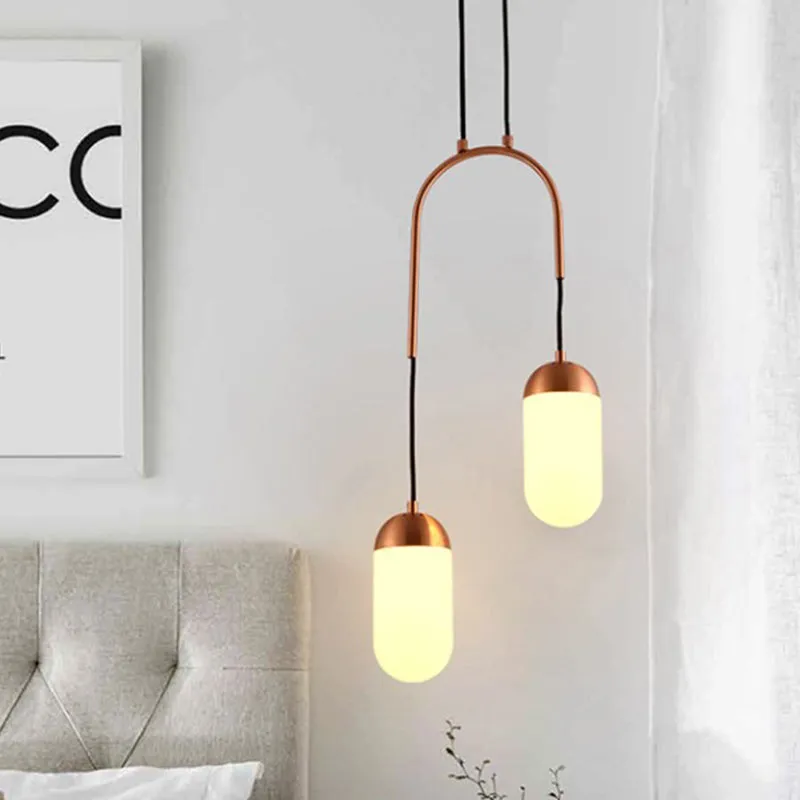 Postmoderne capsule multi-plafondlamp wit glas 2-lichts boogvormige hanglamp bij het bed koper Clearhalo