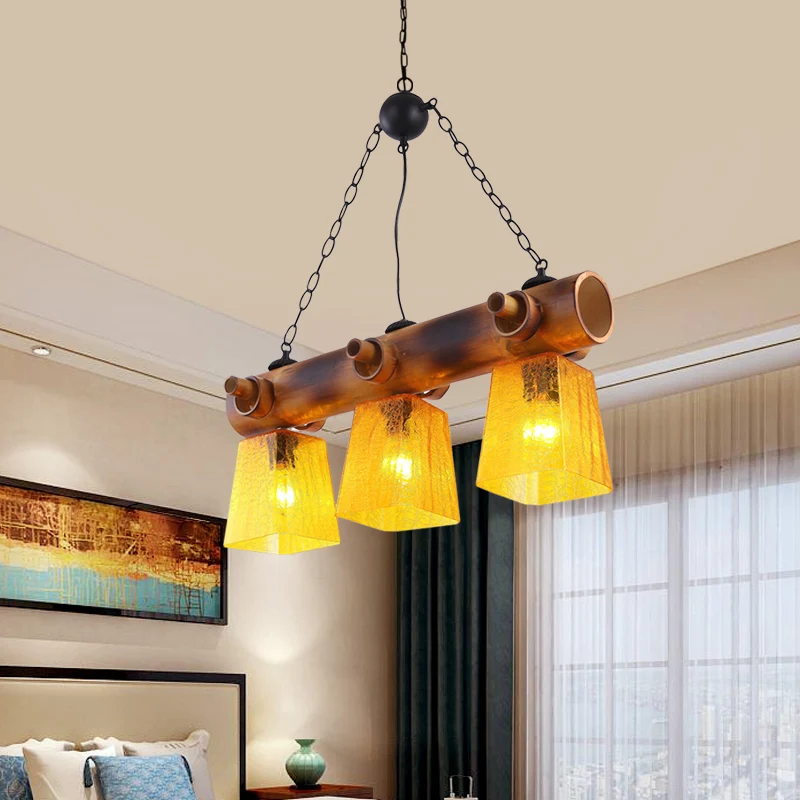 Trapeziumvormige gele waterglazen eilandlamp Countryside Eetkamerhanglamp met 3 lampen bruin met lineaire bamboebundel Cle...