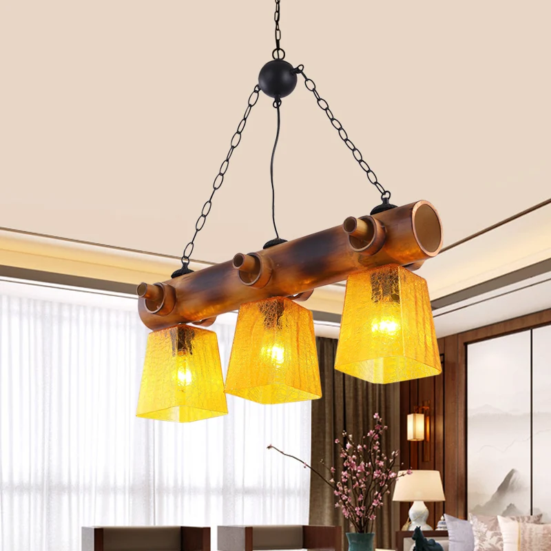 Trapeziumvormige gele waterglazen eilandlamp Countryside Eetkamerhanglamp met 3 lampen bruin met lineaire bamboebundel Cle...