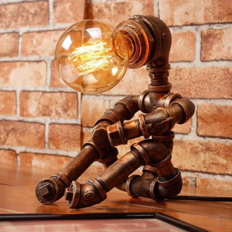 Zittende robot ijzeren nachtkastje lamp retro-stijl tafellamp voor een slaapkamer brons Clearhalo